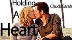 Chuck & Sarah-Holding A Heart 